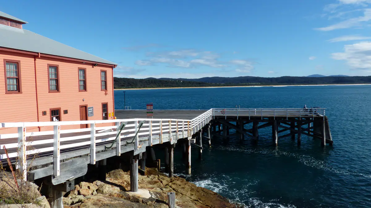 Tathra Wharf and its heritage wharf building on the Sapphire Coast, South East NSW
